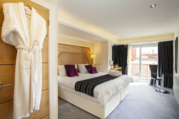 Imagen de la habitación del Hotel Queens Mansions. Foto 6