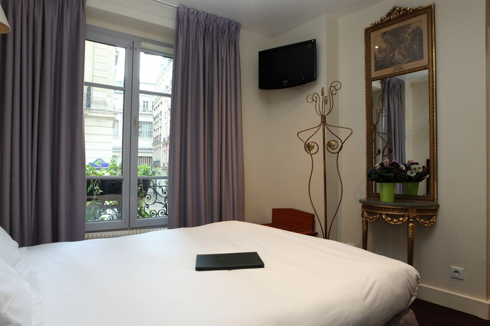 Imagen de la habitación del Hotel Queens, París. Foto 2