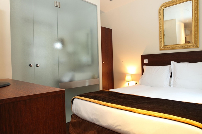 Imagen de la habitación del Hotel Queens, París. Foto 11