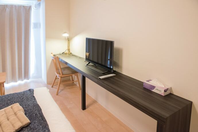 Imagen de la habitación del Hotel Queens Park CK. Foto 12
