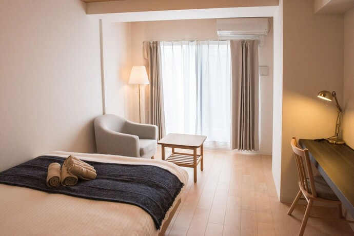 Imagen de la habitación del Hotel Queens Park CK. Foto 18
