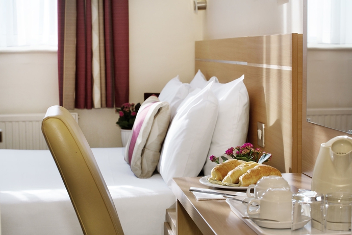 Imagen de la habitación del Hotel Queens Park. Foto 12