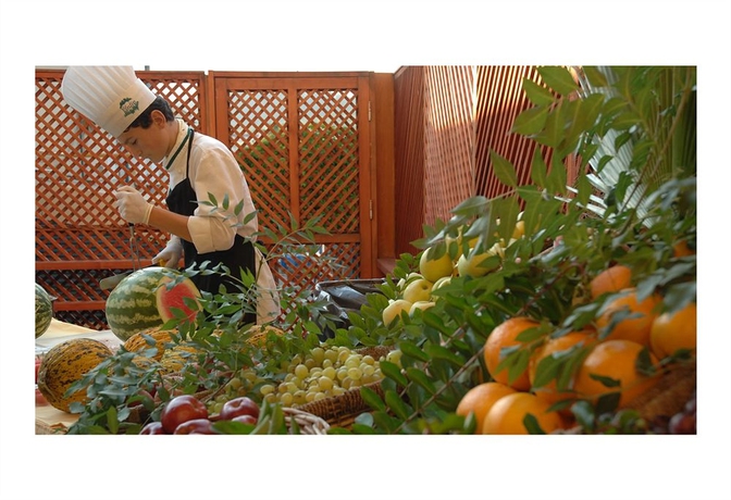 Imagen del bar/restaurante del Hotel Queen's Park Le Jardin - All Inclusive. Foto 4