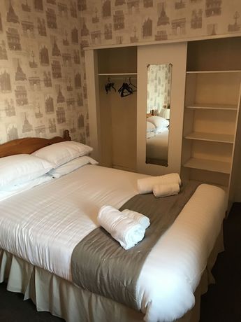 Imagen de la habitación del Hotel Queens Plaza. Foto 11