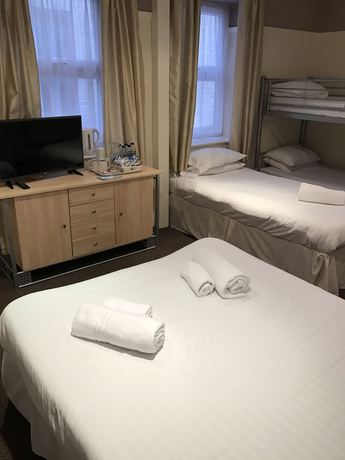 Imagen de la habitación del Hotel Queens Plaza. Foto 15