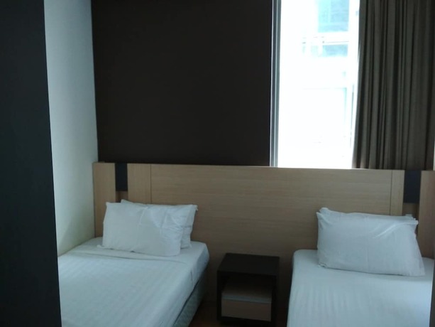 Imagen de la habitación del Hotel Queens Service Suite At Swiss Garden Residences. Foto 16