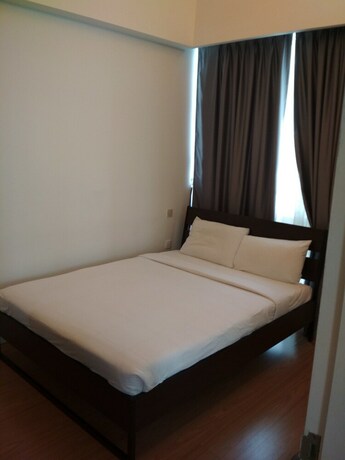 Imagen de la habitación del Hotel Queens Service Suite At Swiss Garden Residences. Foto 27