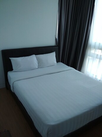 Imagen de la habitación del Hotel Queens Service Suite At Swiss Garden Residences. Foto 31