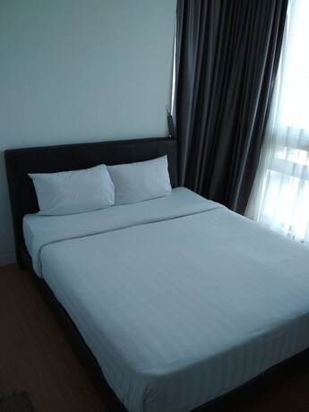 Imagen de la habitación del Hotel Queens Service Suite At Swiss Garden Residences. Foto 32