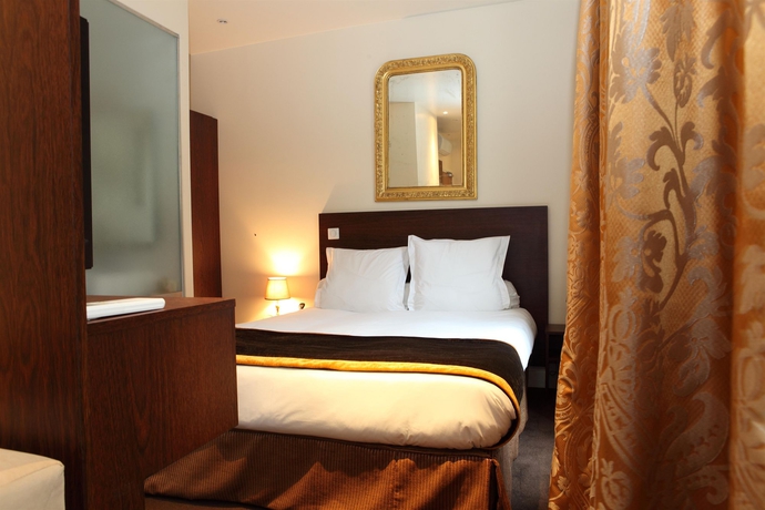 Imagen de la habitación del Hotel Queens, Trocadero. Foto 10