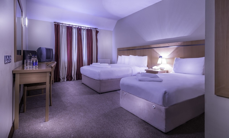 Imagen de la habitación del Hotel Queens and Nightclub. Foto 5