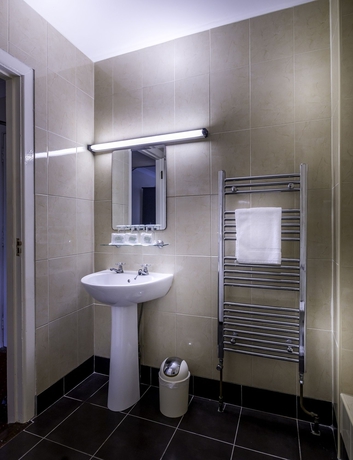 Imagen de la habitación del Hotel Queens and Nightclub. Foto 6