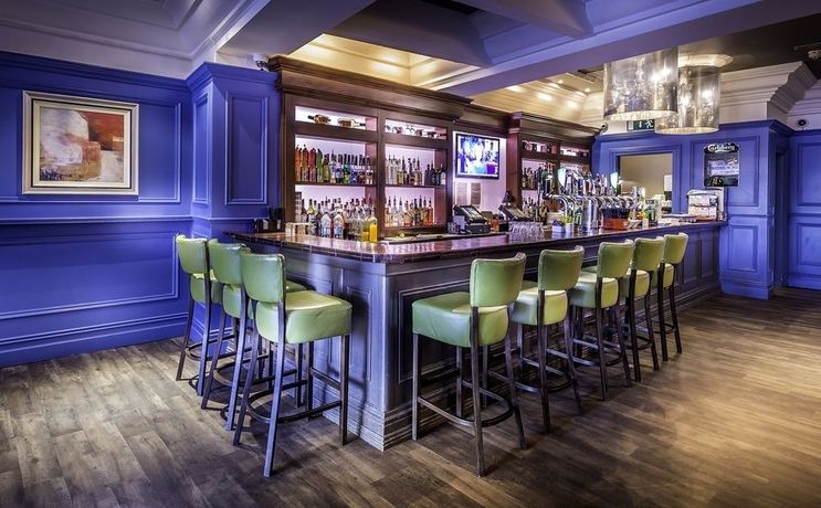 Imagen del bar/restaurante del Hotel Queens and Nightclub. Foto 2