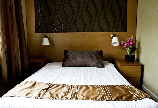 Imagen de la habitación del Hotel Queen's by First Hotels. Foto 3