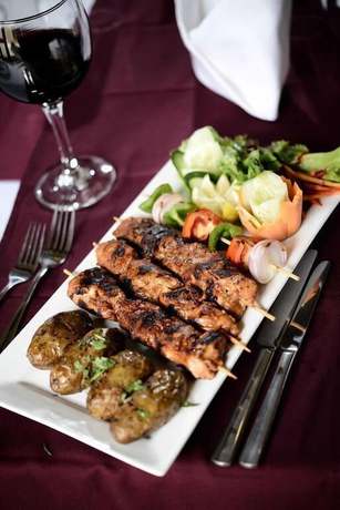 Imagen del bar/restaurante del Hotel Queensgate Continental And Suites. Foto 4