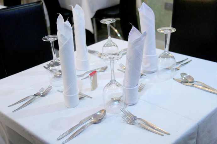 Imagen del bar/restaurante del Hotel Queensgate Continental And Suites. Foto 5