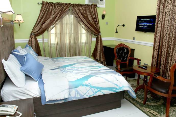 Imagen de la habitación del Hotel Queensgate Continental And Suites. Foto 17