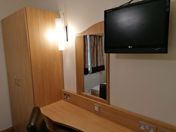 Imagen de la habitación del Hotel Queensgate. Foto 17