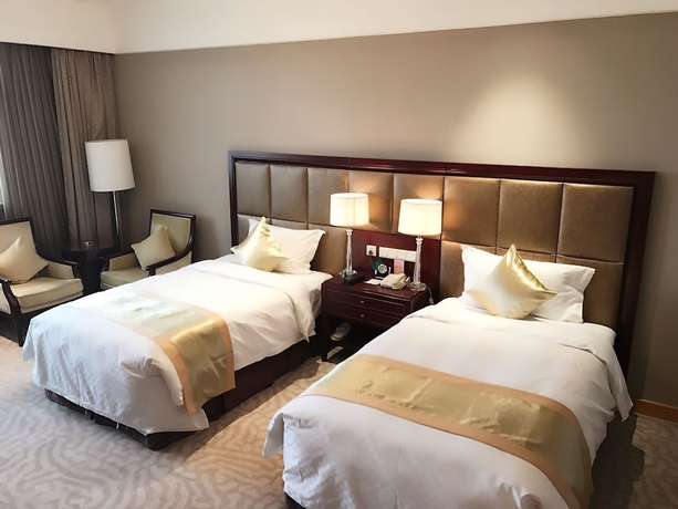 Imagen de la habitación del Hotel Queensir International. Foto 5