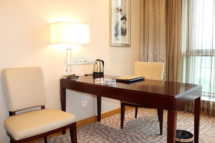Imagen de la habitación del Hotel Queensir International. Foto 6