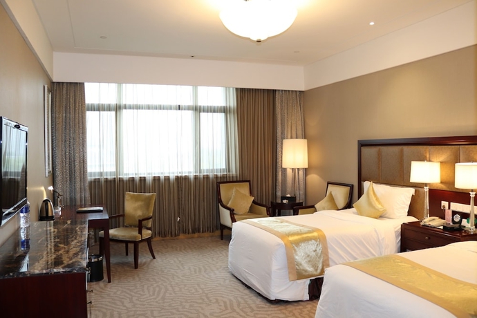 Imagen de la habitación del Hotel Queensir International. Foto 7
