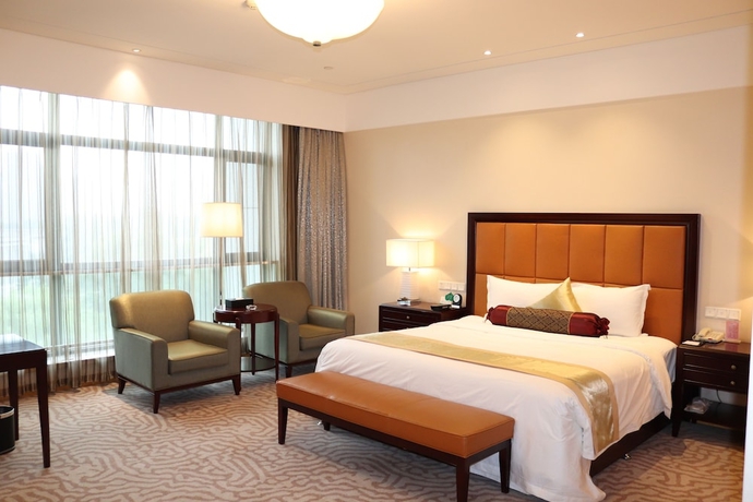 Imagen de la habitación del Hotel Queensir International. Foto 11