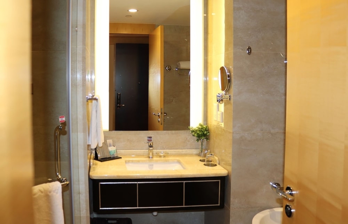 Imagen de la habitación del Hotel Queensir International. Foto 12