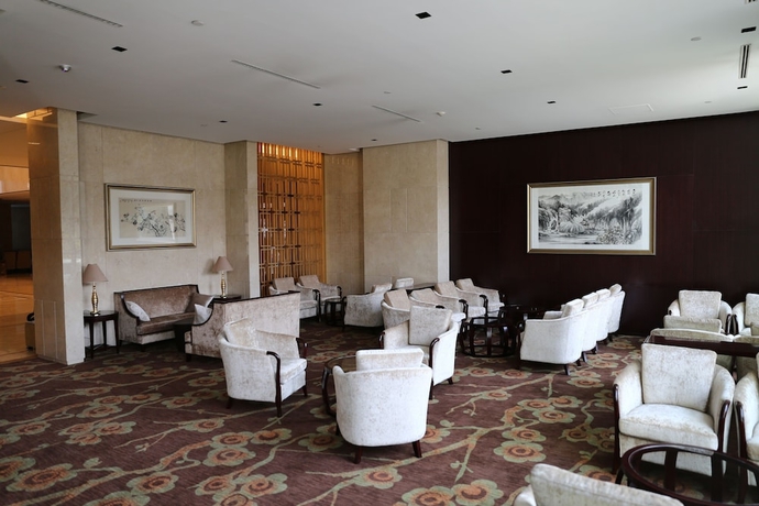 Imagen del bar/restaurante del Hotel Queensir International. Foto 3