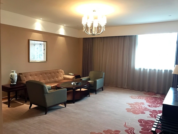 Imagen de la habitación del Hotel Queensir International. Foto 16