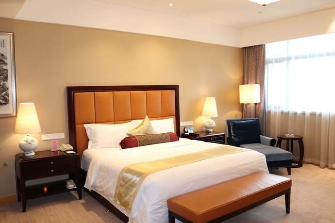 Imagen de la habitación del Hotel Queensir International. Foto 17