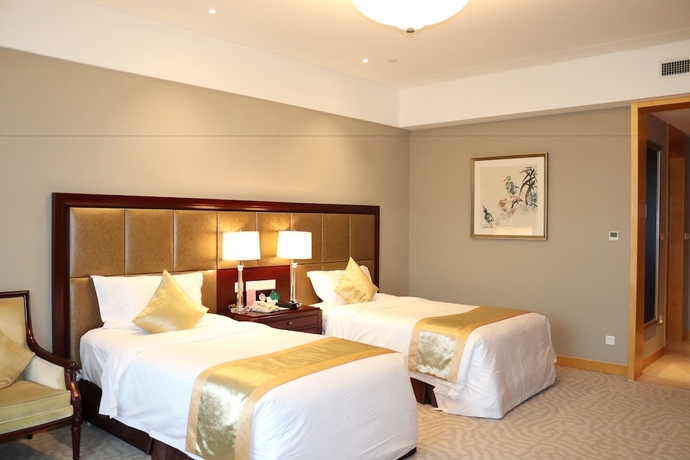 Imagen de la habitación del Hotel Queensir International. Foto 18