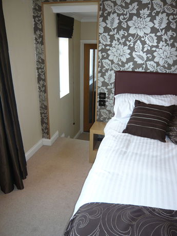 Imagen del bar/restaurante del Hotel Queenswood. Foto 3