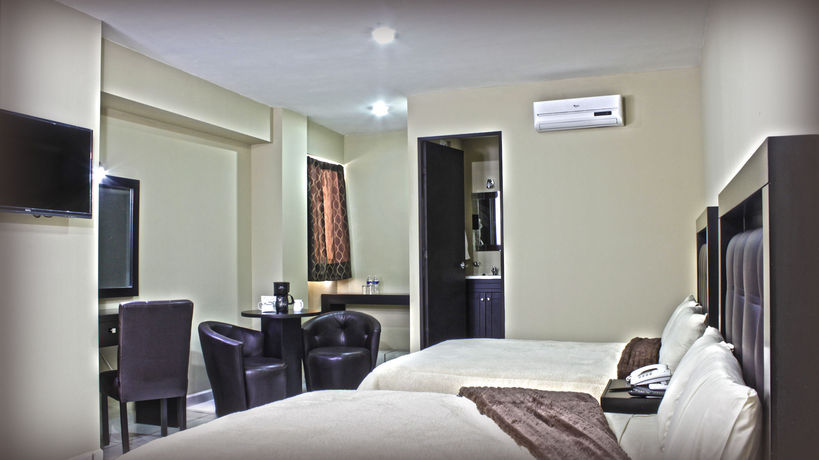 Imagen de la habitación del Hotel Queenton. Foto 6