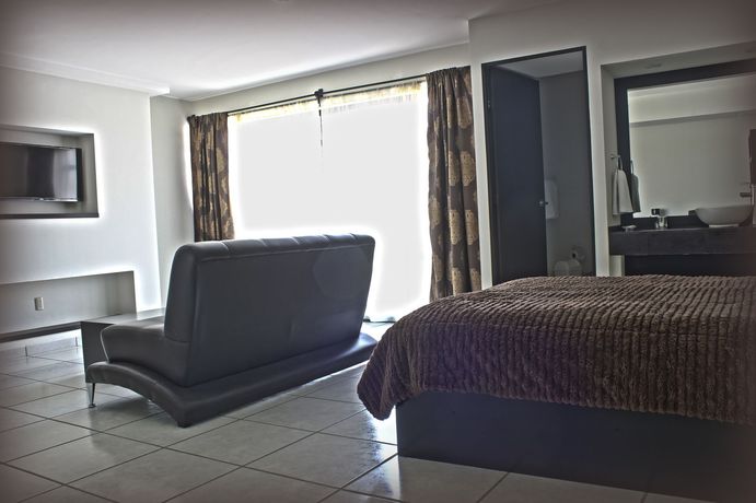 Imagen del bar/restaurante del Hotel Queenton. Foto 3