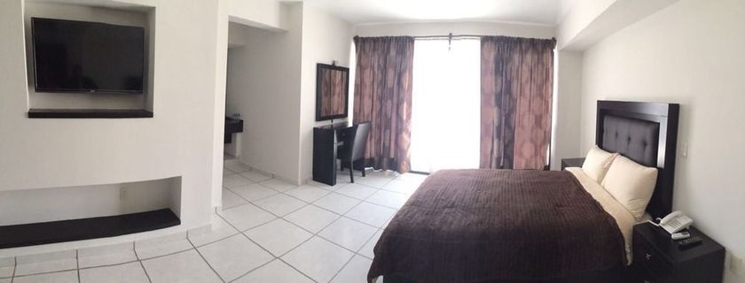 Imagen de los interiores del Hotel Queenton. Foto 16