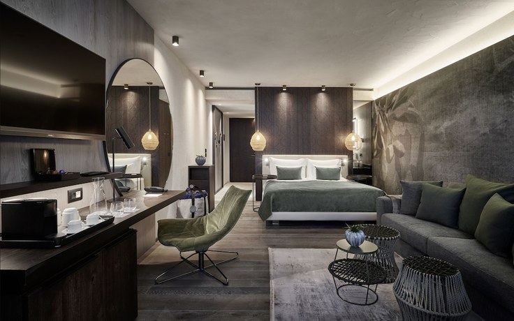 Imagen de la habitación del Hotel Quellenhof Luxury Resort Lazise. Foto 2