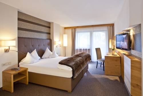 Imagen de la habitación del Hotel Quellenhof Luxury Resort Passeier. Foto 15