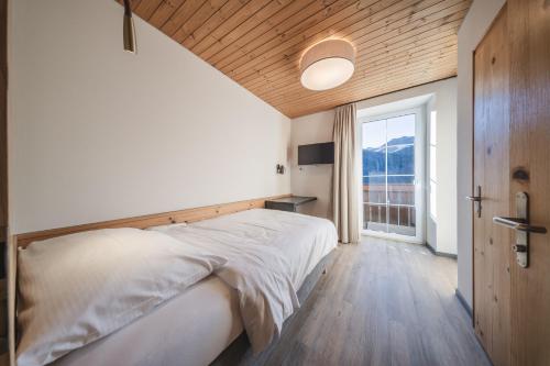 Imagen de la habitación del Hotel Quellenhof - Self Check-in & Adults Only. Foto 13