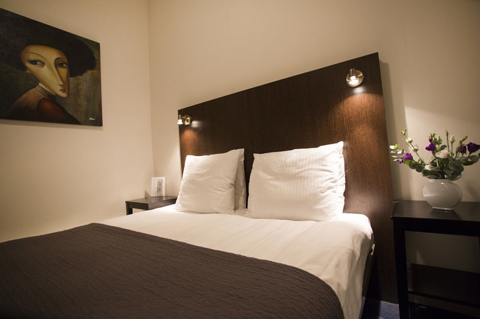 Imagen de la habitación del Hotel Quentin Amsterdam. Foto 6