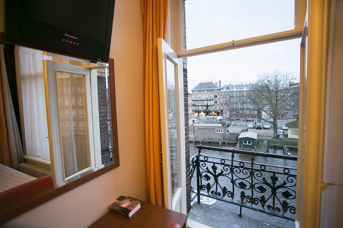 Imagen de la habitación del Hotel Quentin Amsterdam. Foto 8