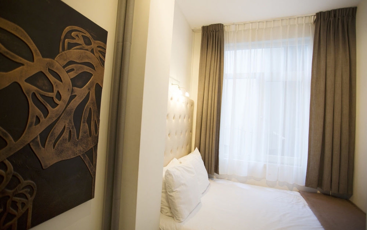 Imagen de la habitación del Hotel Quentin Amsterdam. Foto 10