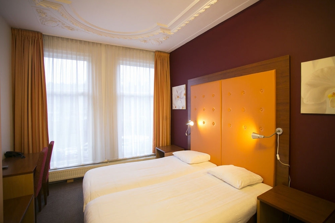 Imagen de la habitación del Hotel Quentin Amsterdam. Foto 11