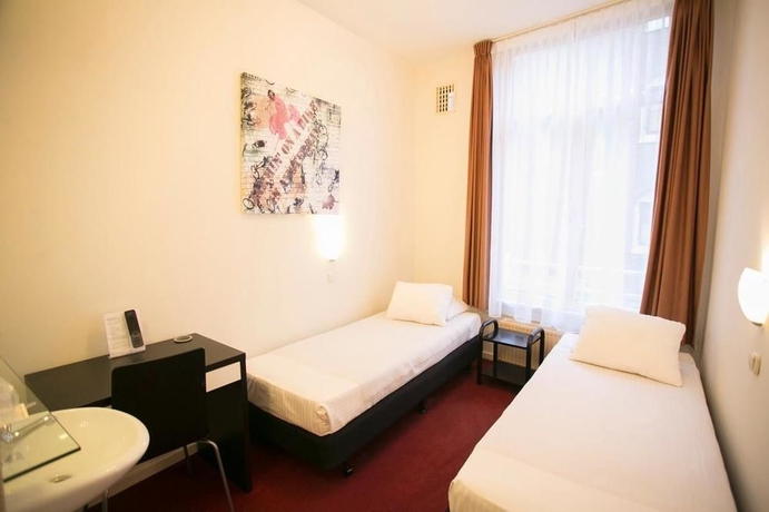 Imagen de la habitación del Hotel Quentin Arrive. Foto 3