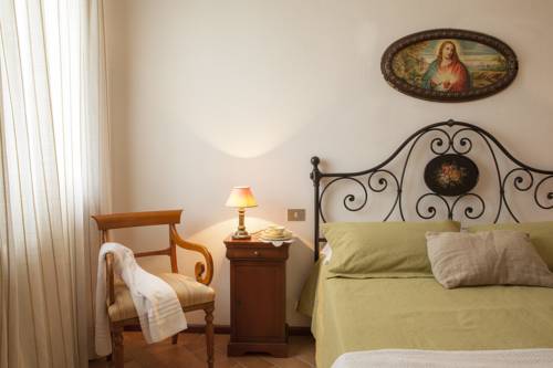 Imagen de la habitación del Hotel Quercia Al Poggio. Foto 16