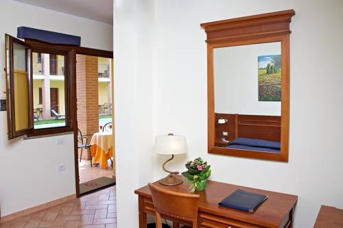 Imagen de la habitación del Hotel Querciolaie. Foto 13