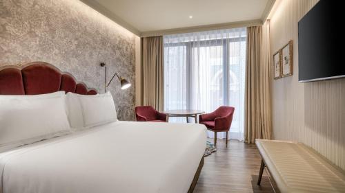 Imagen de la habitación del Hotel Querencia de Sevilla Autograph Collection. Foto 17