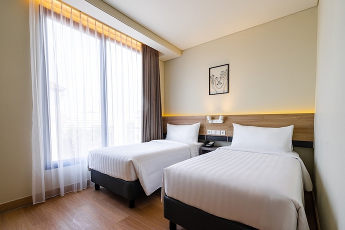 Imagen de la habitación del Hotel Quest Hotel Prime Pemuda - Semarang. Foto 6