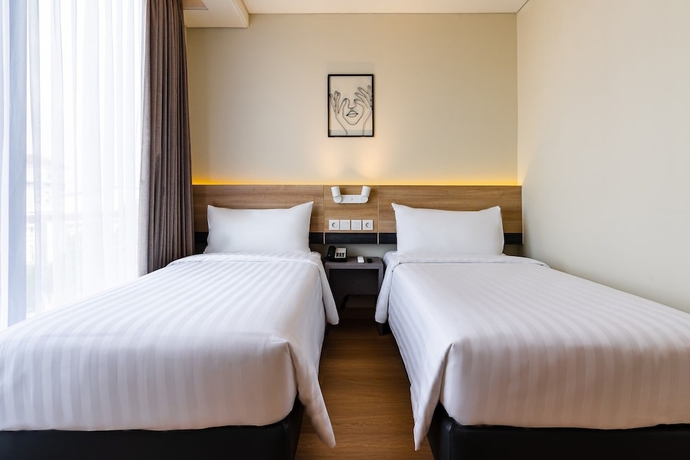 Imagen de la habitación del Hotel Quest Hotel Prime Pemuda - Semarang. Foto 7