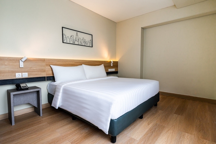 Imagen de la habitación del Hotel Quest Hotel Prime Pemuda - Semarang. Foto 9