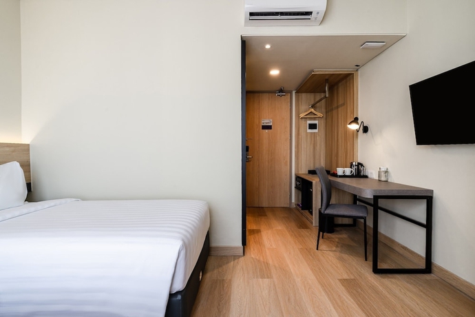 Imagen de la habitación del Hotel Quest Hotel Prime Pemuda - Semarang. Foto 11